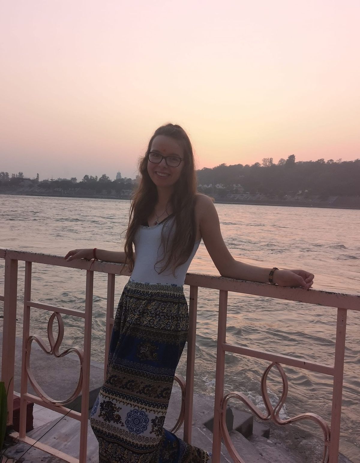 Maja beside the Ganges in Rishikesh at sunset